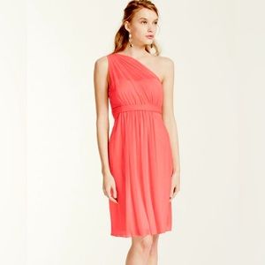 NWT David’s Bridal coral cocktail/bridesmaid dress. One shoulder mesh design.